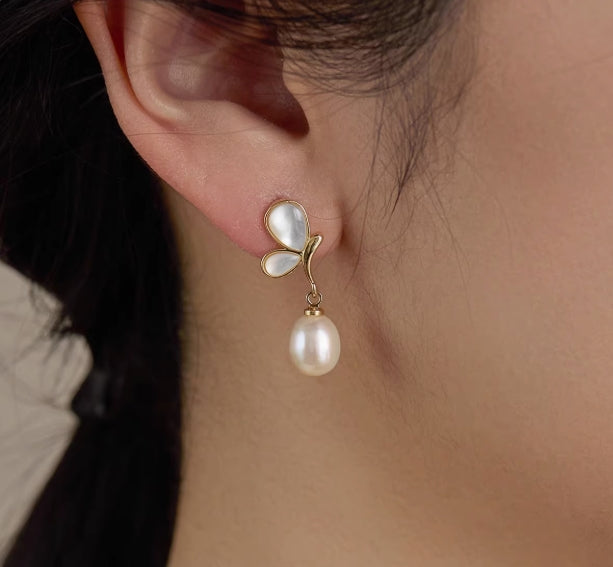 White butterfly shell niche earrings