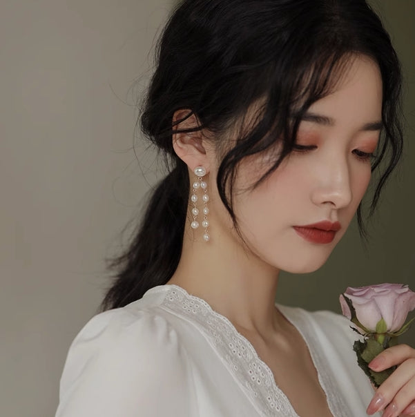 Heavy-duty vintage tassel pearl earrings