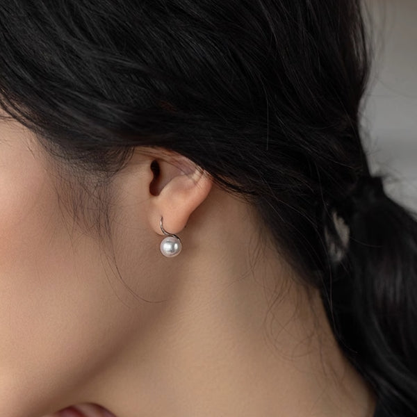 Tall fat pearl earrings