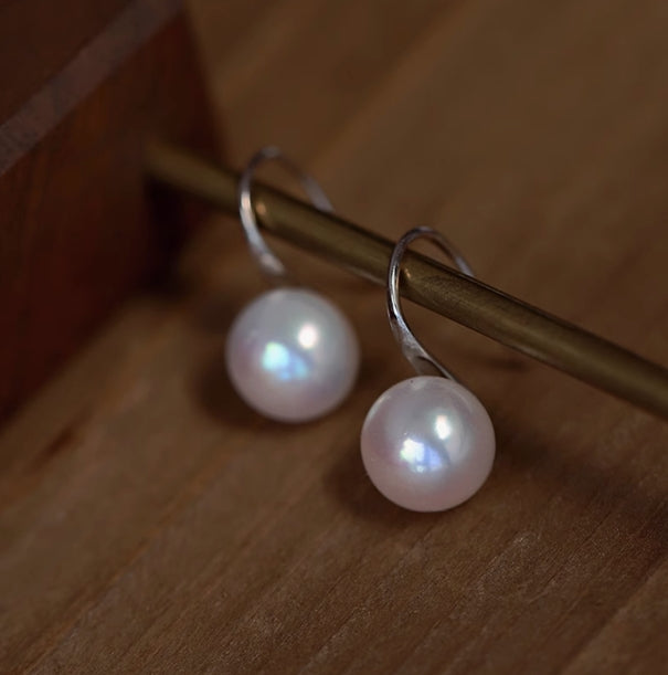 Tall fat pearl earrings