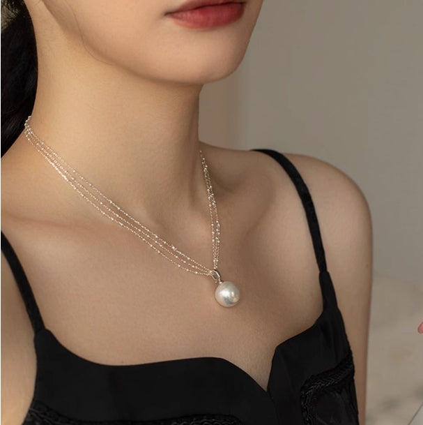 Large size freshwater nearly round pearl pendant