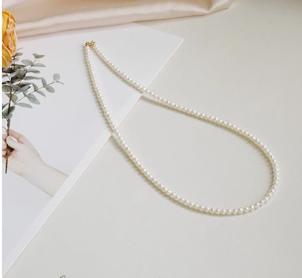 Very fine 2-3mm nearly round freshwater pearl necklace