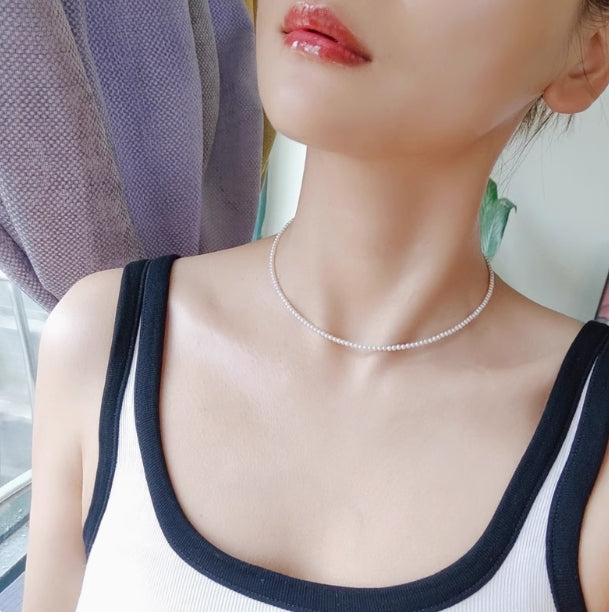 Very fine 2-3mm nearly round freshwater pearl necklace