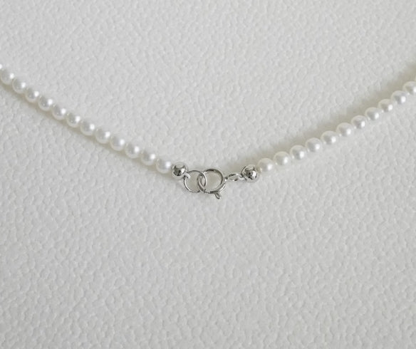 Very fine 2-3mm nearly round freshwater pearl necklace