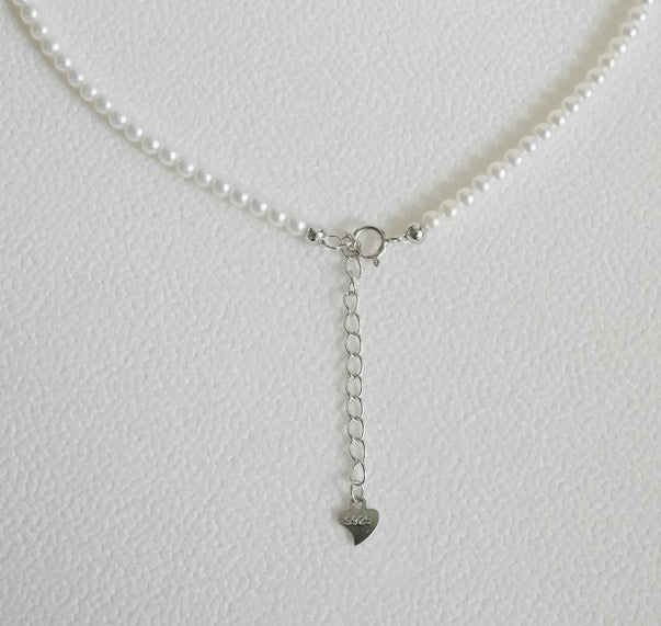 Very fine 2-3mm nearly round freshwater pearl necklace