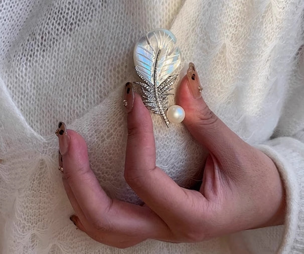 Mother-of-pearl feather brooch