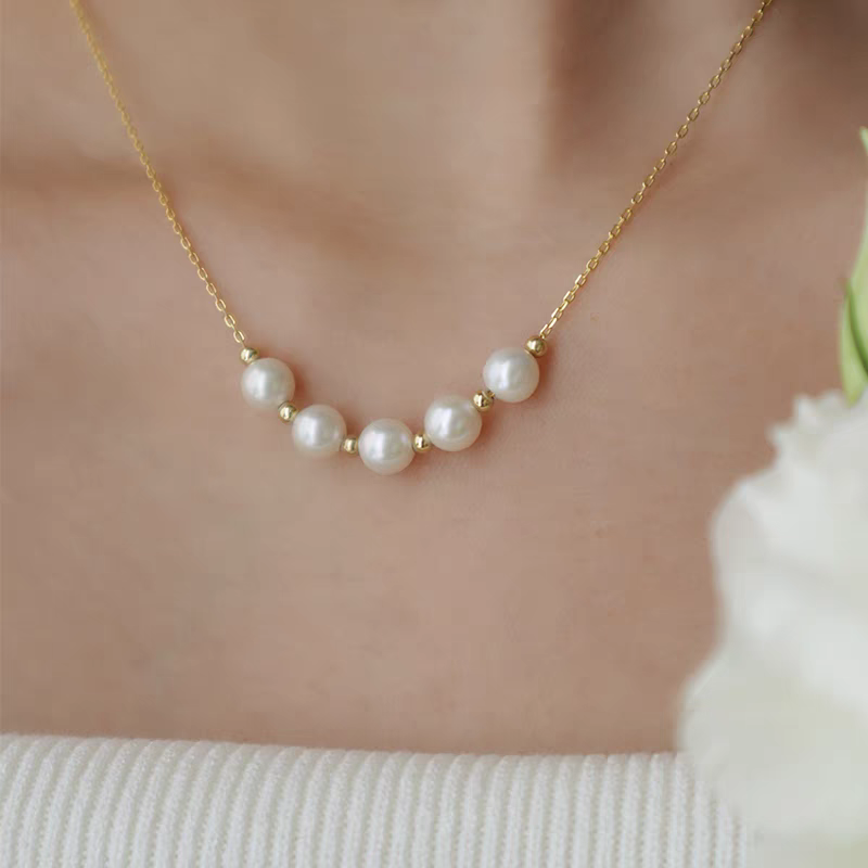 Smile five pearl necklace