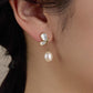 White butterfly shell niche earrings