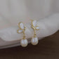 White butterfly shell niche earrings