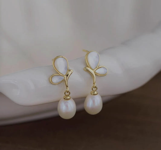 White butterfly shell niche earrings
