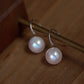Tall fat pearl earrings