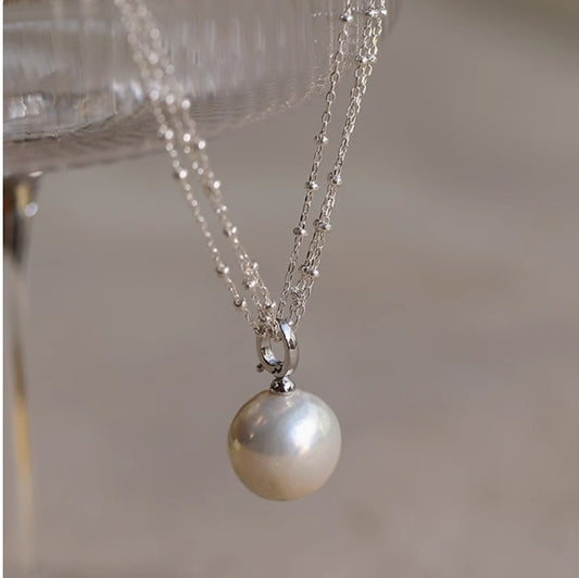 Large size freshwater nearly round pearl pendant