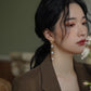 Retro and versatile long pearl earrings