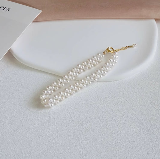 3-4mm natural freshwater nearly round pearl braided bracelet
