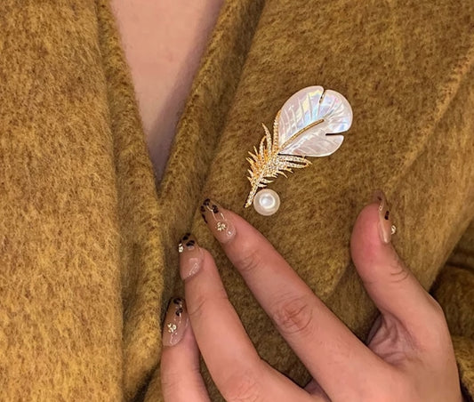 Mother-of-pearl feather brooch