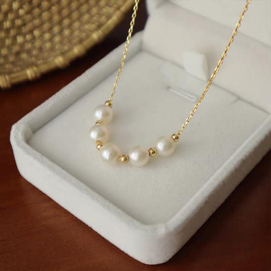 Smile five pearl necklace